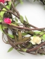 Preview: Kranz aus Naturzweigen mit Blüten, 25 cm